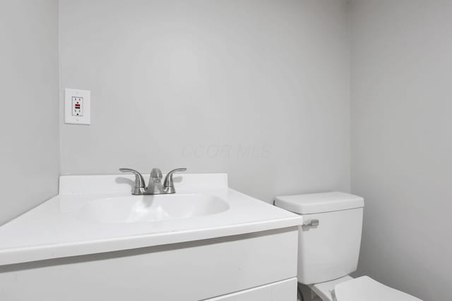 1617 Arlington Ave, Columbus, OH 43211 - half bathroom with vanity and toilet