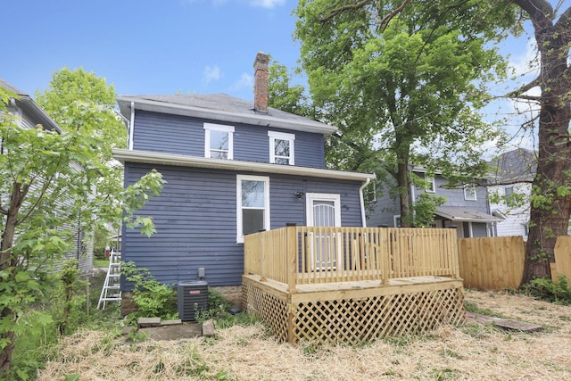 1617 Arlington Ave, Columbus, OH 43211 - back of property with a chimney, a wooden deck, central AC unit, and fence