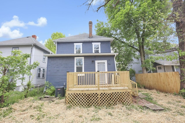 1617 Arlington Ave, Columbus, OH 43211 - back of house with fence, a wooden deck, central AC, and a chimney