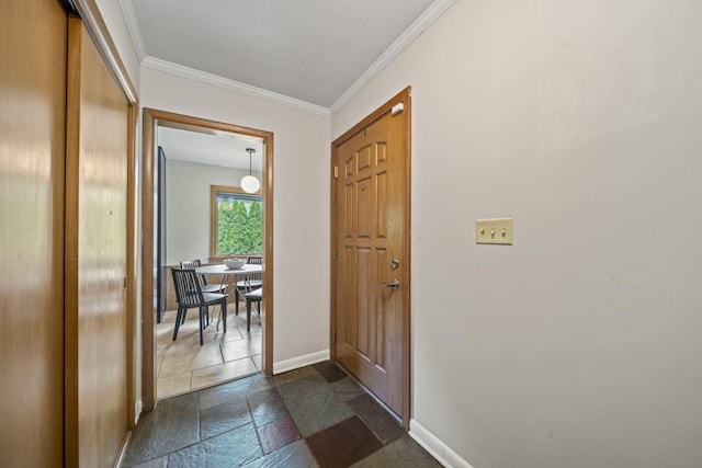 2249 E Broad St, Columbus, OH 43209 - entryway with baseboards, crown molding, and stone tile flooring