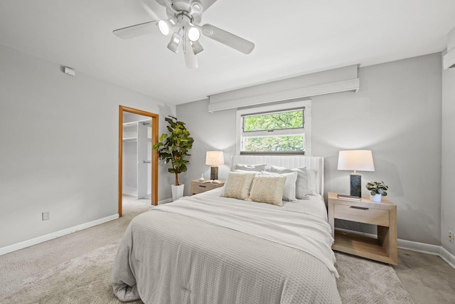 2249 E Broad St, Columbus, OH 43209 - bedroom featuring carpet, baseboards, a spacious closet, a ceiling fan, and a closet