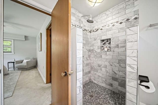 2249 E Broad St, Columbus, OH 43209 - bathroom featuring a tile shower and baseboards
