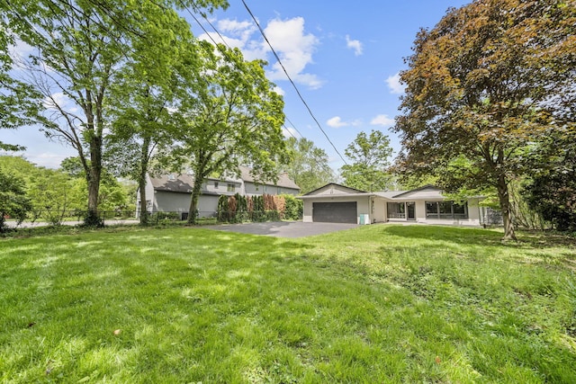 2249 E Broad St, Columbus, OH 43209 - view of front of home with asphalt driveway and an attached garage