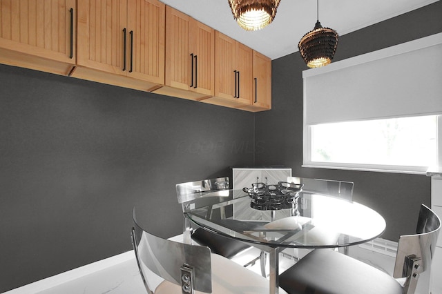 3130 Marwick Rd, Columbus, OH 43232 - dining space with baseboards, marble finish floors, and a chandelier