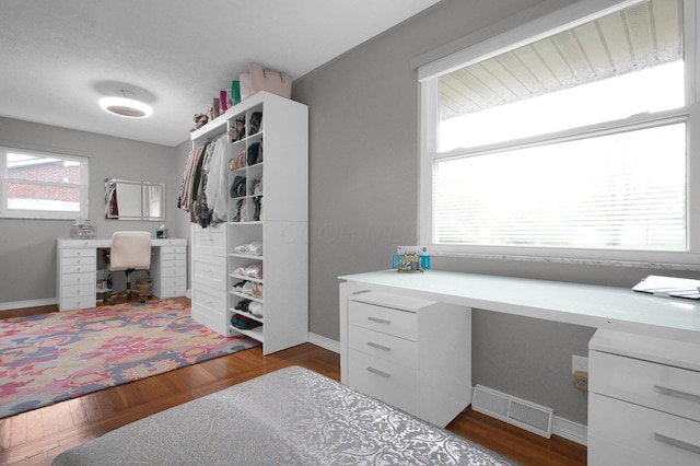 3130 Marwick Rd, Columbus, OH 43232 - office space featuring built in desk, dark wood-style floors, and baseboards