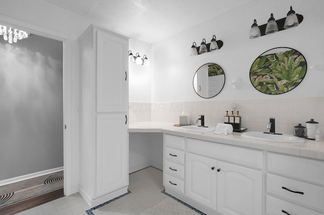 3130 Marwick Rd, Columbus, OH 43232 - full bathroom with double vanity and tile patterned floors