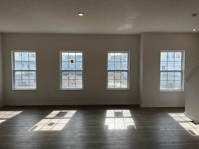 104 Red Willow Dr, Etna, OH 43068 - unfurnished room featuring wood-type flooring, plenty of natural light, baseboards, and recessed lighting