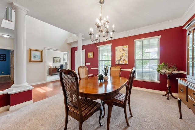 6674 Letterman Dr, Powell, OH 43065 - dining space featuring ornate columns, light colored carpet, plenty of natural light, baseboards, and ornamental molding