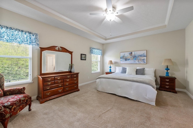 6674 Letterman Dr, Powell, OH 43065 - bedroom featuring a tray ceiling, light colored carpet, baseboards, and ornamental molding