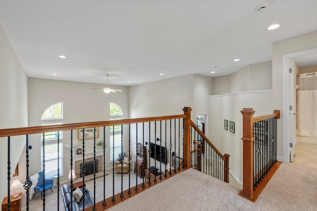6674 Letterman Dr, Powell, OH 43065 - hallway with an upstairs landing, carpet floors, recessed lighting, and baseboards