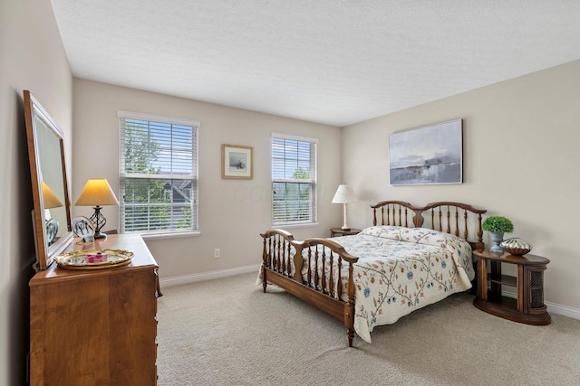6674 Letterman Dr, Powell, OH 43065 - bedroom featuring carpet flooring, baseboards, and a textured ceiling