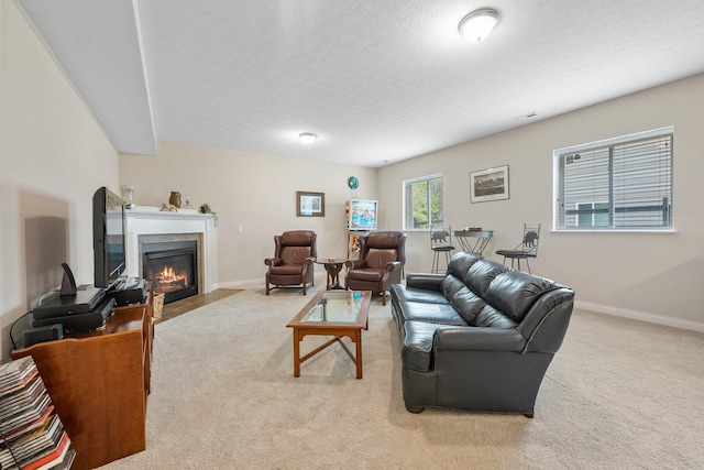 6674 Letterman Dr, Powell, OH 43065 - living area with carpet floors, a fireplace with flush hearth, and baseboards