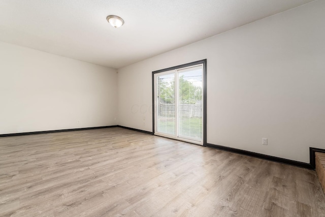 2594 Hubbell Rd, Columbus, OH 43232 - unfurnished room with wood finished floors and baseboards