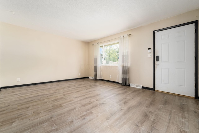 2594 Hubbell Rd, Columbus, OH 43232 - spare room featuring wood finished floors and baseboards