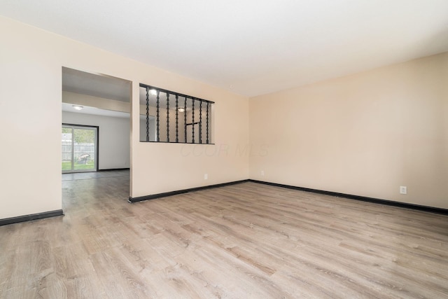 2594 Hubbell Rd, Columbus, OH 43232 - spare room featuring wood finished floors and baseboards