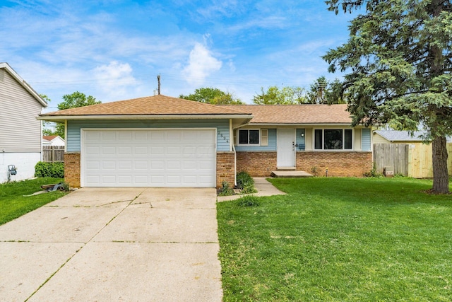 2594 Hubbell Rd, Columbus, OH 43232 - ranch-style home with brick siding, a garage, and driveway