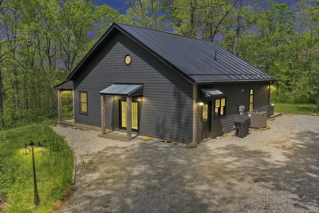 28306 Allison Rd, Mcarthur, OH 45651 - view of front of house with central AC and metal roof