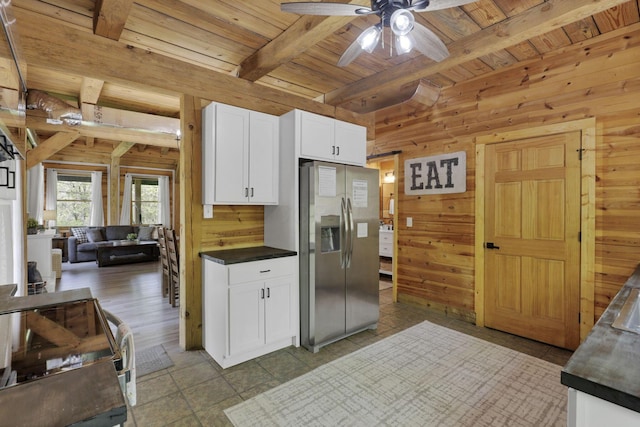 28306 Allison Rd, Mcarthur, OH 45651 - kitchen featuring stainless steel fridge with ice dispenser, wood ceiling, dark countertops, wood walls, and beamed ceiling