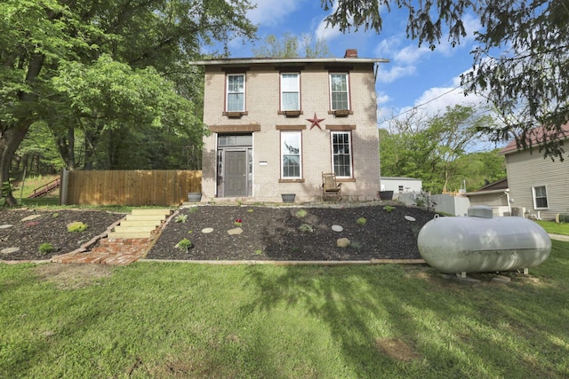 998 Wayne Ave, Zanesville, OH 43701 - view of front facade with brick siding and a chimney