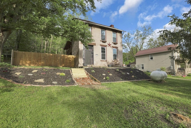 998 Wayne Ave, Zanesville, OH 43701 - rear view of house featuring a chimney and brick siding
