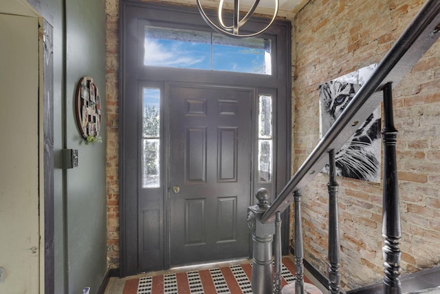 998 Wayne Ave, Zanesville, OH 43701 - foyer entrance with brick wall