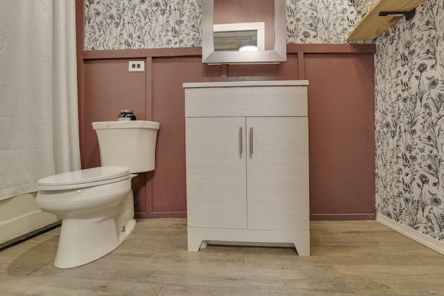 998 Wayne Ave, Zanesville, OH 43701 - bathroom featuring wallpapered walls, toilet, wood finished floors, and vanity