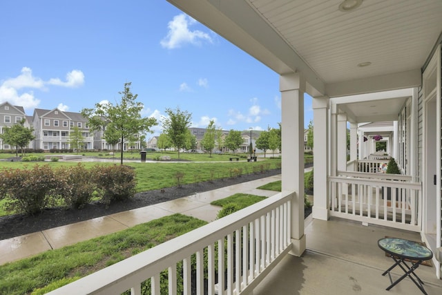 1242 N Grant Ave, Columbus, OH 43201 - balcony featuring a porch and a residential view