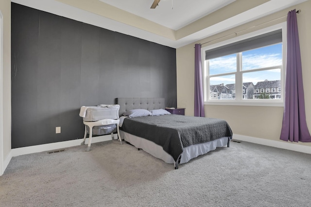 1242 N Grant Ave, Columbus, OH 43201 - carpeted bedroom featuring baseboards and ceiling fan