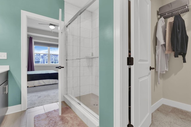 1242 N Grant Ave, Columbus, OH 43201 - full bath with a shower stall, baseboards, ensuite bath, and vanity