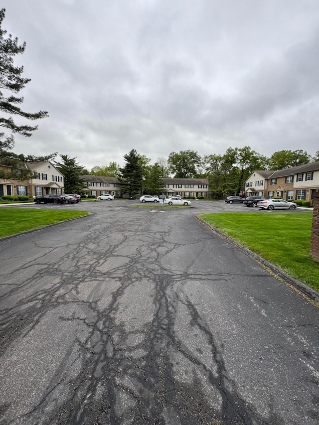 7782 Hansgrove Ct, Dublin, OH 43016 - view of asphalt road featuring a residential view and curbs