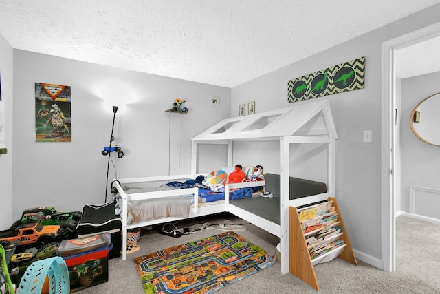 6528 Shenandoah Dr, Reynoldsburg, OH 43068 - carpeted bedroom with a textured ceiling and baseboards
