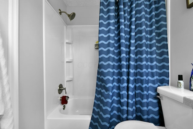 6528 Shenandoah Dr, Reynoldsburg, OH 43068 - full bathroom featuring toilet, shower / tub combo with curtain, and a textured ceiling