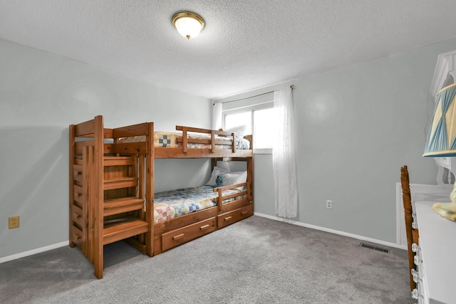 12164 Twincreek Dr, Pickerington, OH 43147 - carpeted bedroom featuring a textured ceiling and baseboards