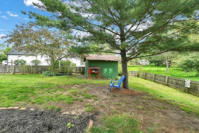 12164 Twincreek Dr, Pickerington, OH 43147 - view of yard with a storage unit and an outdoor structure