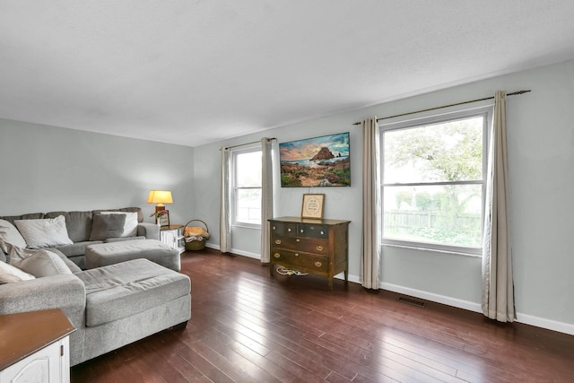 12164 Twincreek Dr, Pickerington, OH 43147 - living room featuring dark wood-style floors and baseboards