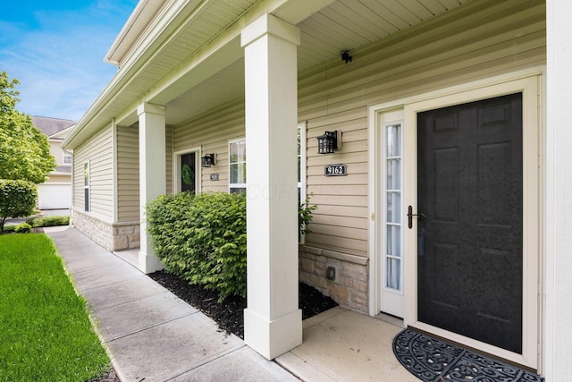 9162 Scenic View Cir, Columbus, OH 43240 - doorway to property with a porch