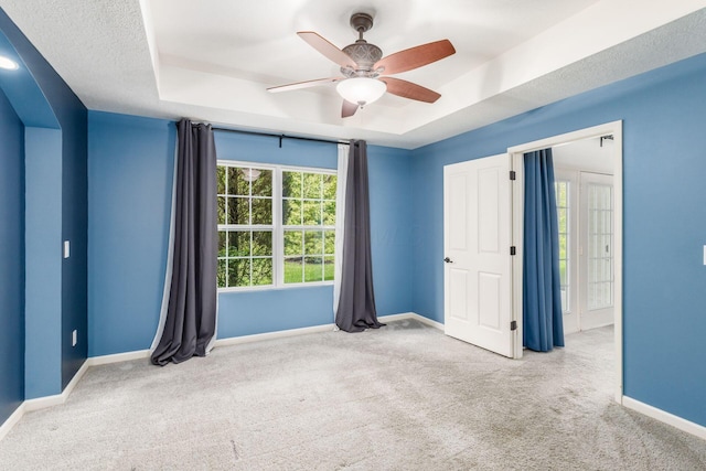 9162 Scenic View Cir, Columbus, OH 43240 - unfurnished bedroom with carpet, baseboards, and a tray ceiling