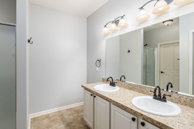 9162 Scenic View Cir, Columbus, OH 43240 - full bathroom featuring a stall shower, baseboards, and double vanity