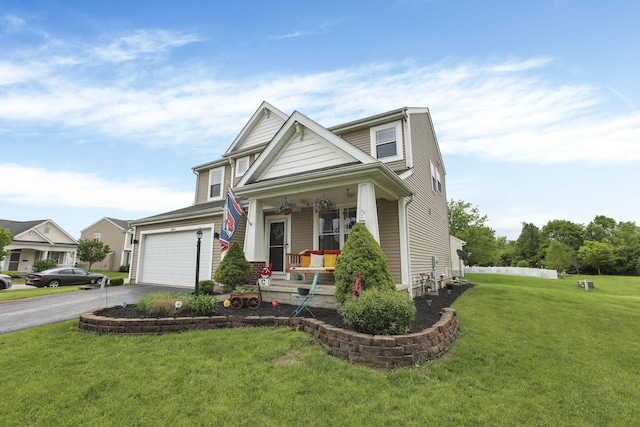 6843 John Dr, Canal Winchester, OH 43110 - view of front facade with a porch, driveway, and a front yard