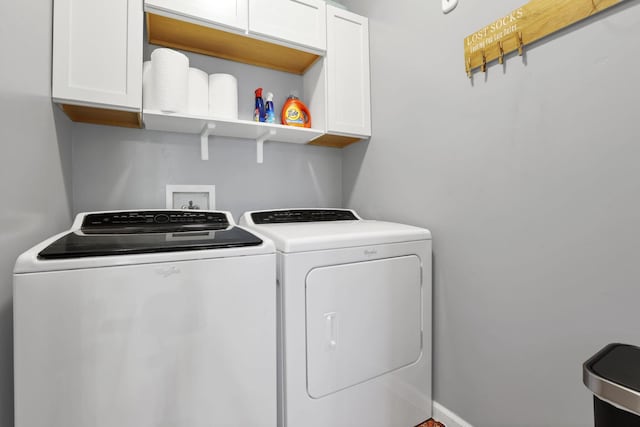 6843 John Dr, Canal Winchester, OH 43110 - laundry room with cabinet space and washing machine and clothes dryer