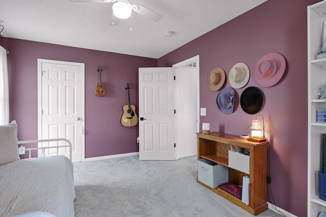 6843 John Dr, Canal Winchester, OH 43110 - carpeted bedroom with baseboards and ceiling fan