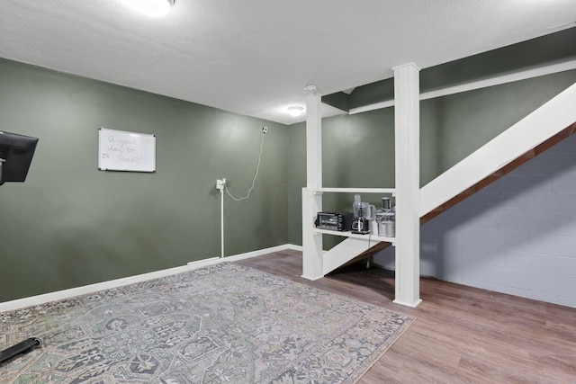 6843 John Dr, Canal Winchester, OH 43110 - finished basement featuring wood finished floors and baseboards