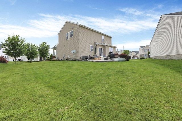 6843 John Dr, Canal Winchester, OH 43110 - rear view of house featuring a lawn
