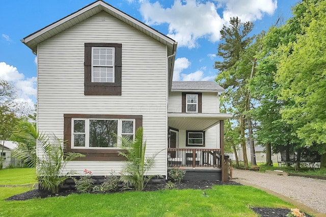 443 E Farming St, Marion, OH 43302 - traditional-style home featuring covered porch and a front yard