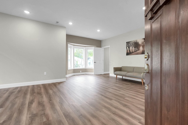 443 E Farming St, Marion, OH 43302 - living area featuring wood finished floors, baseboards, and recessed lighting