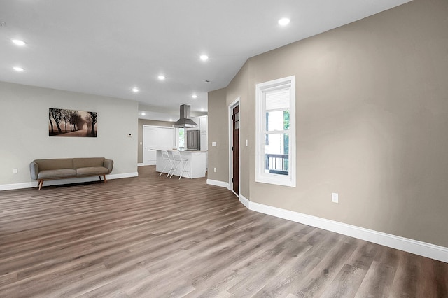 443 E Farming St, Marion, OH 43302 - living area featuring wood finished floors, baseboards, and recessed lighting