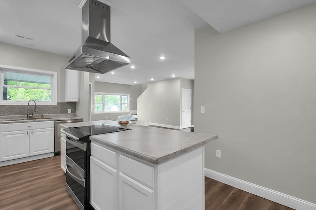 443 E Farming St, Marion, OH 43302 - kitchen featuring island range hood, stainless steel range with electric cooktop, a sink, a kitchen island, and dark wood finished floors