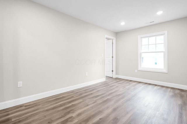 443 E Farming St, Marion, OH 43302 - unfurnished room featuring wood finished floors, baseboards, and recessed lighting