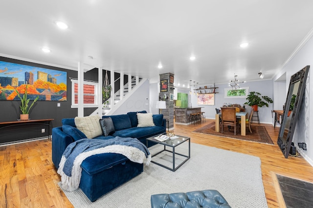 1602 Franklin Ave, Columbus, OH 43205 - living room with ornamental molding, stairs, wood finished floors, baseboards, and recessed lighting