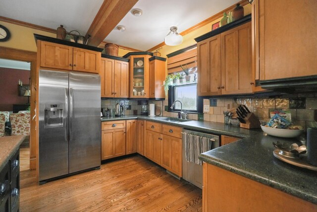 1452 W Cook Rd, Mansfield, OH 44906 - kitchen featuring stainless steel fridge with ice dispenser, ornamental molding, dishwashing machine, a sink, and tasteful backsplash
